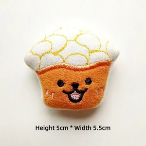 Detailed embroidery of cartoon cup plush doll with smile face, size 5cm high by 5.5cm wide
