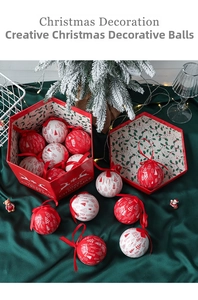Christmas decoration balls in red and white colors packaged in a hexagonal gift box