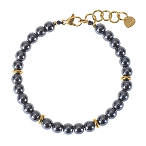 Detail of 6mm black bead bracelet with gold stainless steel heart charm and extender