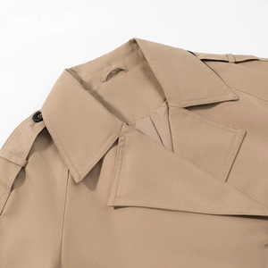Women's khaki short trench coat featuring double-breasted lapel and epaulets detail
