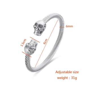 Detail view of adjustable silver skull cable bracelet with 6mm wire and 31g weight