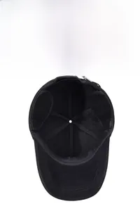 Detail of winter baseball cap interior lining and foldable ear flaps for warmth