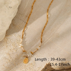 Detail showing natural stone bead necklace and paperclip chain with length measurements