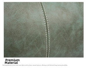 Detail view of durable gray-green frosted faux leather with reinforced double stitching