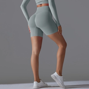 Detail view of seamless high-waisted yoga shorts with scrunch butt lifting effect