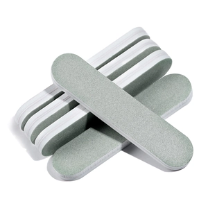 Detailed view of 6-piece gray-green nail buffer set with thick white foam core