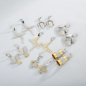 Collection of minimalist gold and silver floral and geometric dangle earrings set
