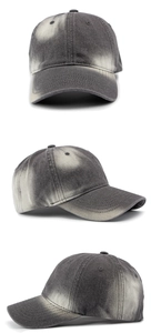 Three angles of a dark grey washed denim baseball cap with vintage faded finish and curved brim