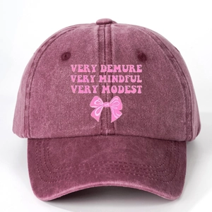 Vintage washed baseball cap with Very Demure slogan print and pink bow design