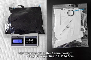 Detail of Halloween party banner weight 45.1g and package size 19.5 by 24.5cm