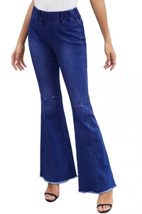 Detail of high-waist flared jeans featuring elastic waist and distressed knee holes