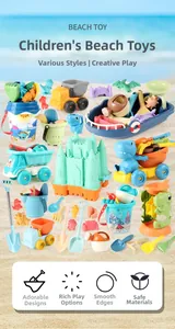 Close-up of children's beach toy set with colorful sand molds and watering can on sand