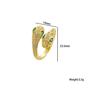 Gold double-headed snake ring with green and white cubic zirconia accents 3.5g