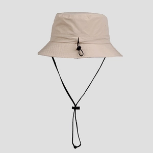 Detail of light beige quick-dry nylon sun hat featuring adjustable drawstring and chin strap