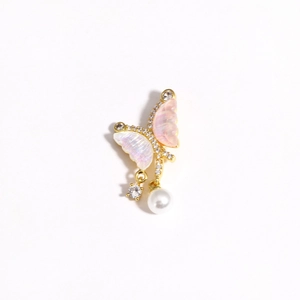 Detail of butterfly pendant with pink enamel wings, zircon stones and pearl drop