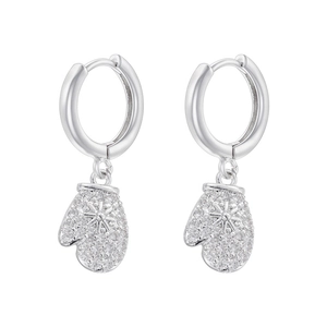 Detailed close-up of silver-plated Christmas glove earrings with micro-pave zircons