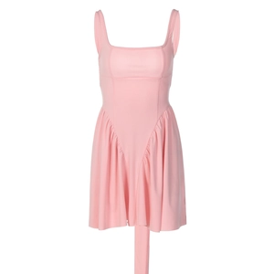Detail of pink backless strap dress showing square neck design and ruffled hemline