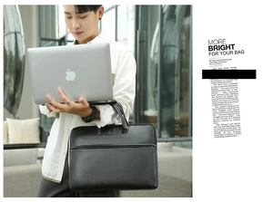 Minimalist black laptop briefcase shown with a modern business professional lifestyle