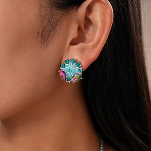 Close-up of vintage floral stud earrings with colorful crystals and rhinestones for women