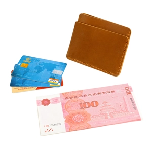 Vintage brown crazy horse leather card holder with handmade stitching and slim design