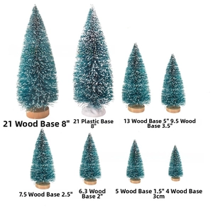 Miniature sisal Christmas tree set in various sizes from 4cm to 21cm with snow effect