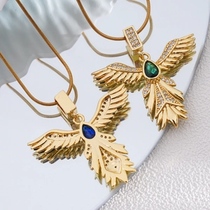 Gold-plated phoenix wing necklace with emerald and blue teardrop stones on a snake chain