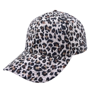 Detailed view of the leopard print pattern and stitching on a stylish baseball cap