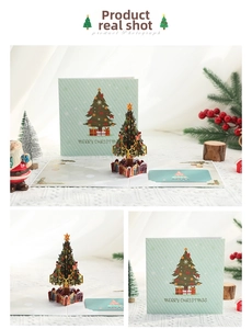 Détail de la carte de Noël 3D avec un sapin pop-up vert et une étoile dorée