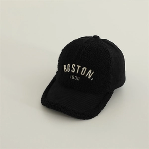 Detail of Boston 1630 embroidery on black fleece and corduroy baseball cap for kids