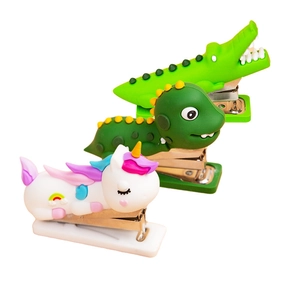 Mini cartoon animal staplers featuring crocodile, dinosaur, and unicorn shaped designs