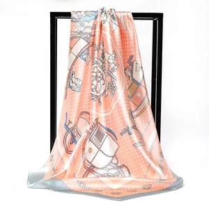 Detailed view of square silk scarf with horse carriage print and blue borders hanging