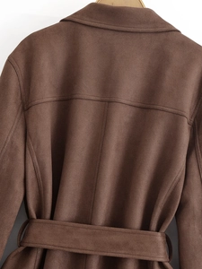 Detailed back view of dark brown faux suede trench coat showing waist belt and stitching