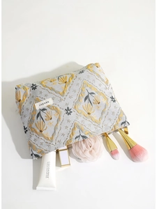 Floral jacquard travel makeup bag with blue patterns and high capacity zipper storage