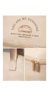 Detail of metal dual zippers and reinforced stitching on the thermal lunch box bag