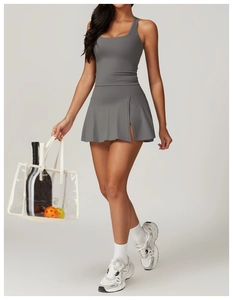Charcoal grey racerback tank top and side-slit tennis skirt set for fitness