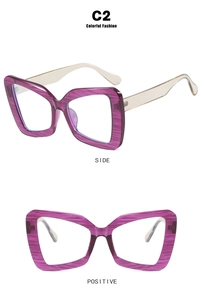 Macro view of purple marble texture frames and light transparent temples on fashion glasses