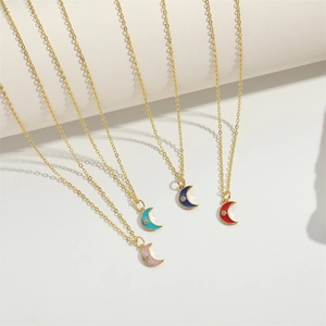 Classic crescent moon pendant necklaces in four colors with gold chains and crystals