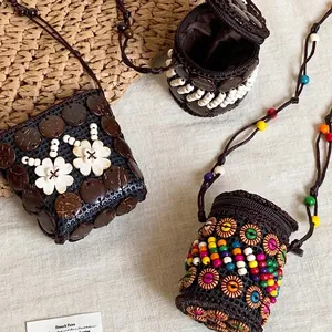 Bohemian handmade woven coconut shell mini bags with colorful wooden beads and floral accents