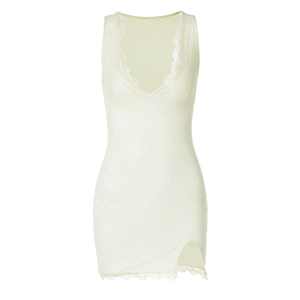 Detail of pale yellow lace dress featuring V-neckline and intricate floral crochet pattern