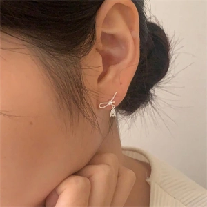 Elegant 925 silver bow stud earrings featuring a teardrop zircon pendant for women
