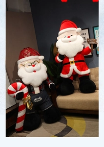 Close-up of large Santa plush with candy cane in a cozy Christmas home setting
