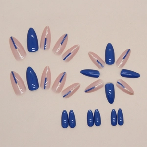 Almond shaped press-on nails in blue and nude pink colors with silver glitter lines