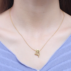 Golden titanium steel snake chain necklace with hollow rose flower pendant for women