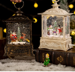 Detail of Christmas lantern decorations with Santa and Snowman scenes in bronze and white