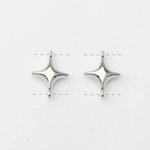 Detailed macro view of silver plated cross star pendants with dual rings for DIY jewelry
