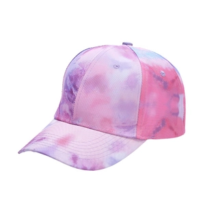 Pink, purple and blue tie-dye baseball cap with curved brim on white background