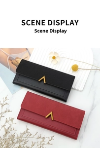 Chic long wallets in black and red with gold V-buckle on a modern marble setting