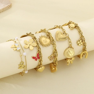 18K gold plated stainless steel charm bracelet set featuring heart and floral pendants