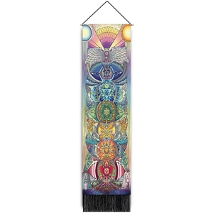 Macro shot of bohemian tapestry detailing rainbow owl pattern and black fringe accents