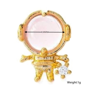 Macro view of gold astronaut stud earring with pink mask and white cubic zirconia stone